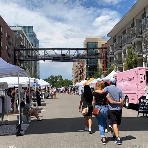a view of a street with sitting area