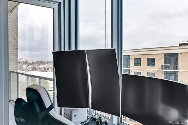 a kitchen with a refrigerator and a window
