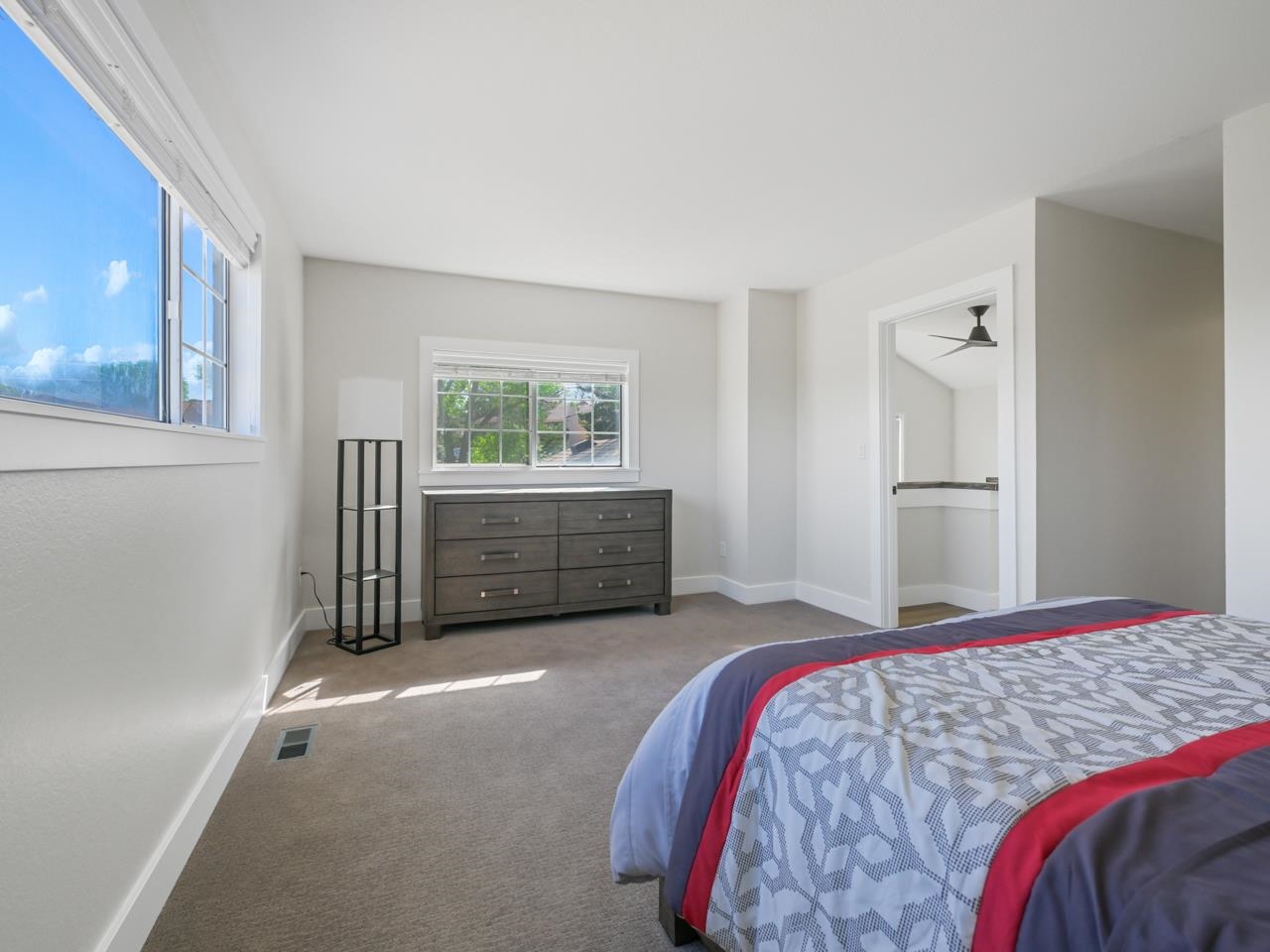 383 Explorer Court, Unit B Grand Junction, CO 81507 - Photo 22 of 40 a bedroom with a bed and a window
