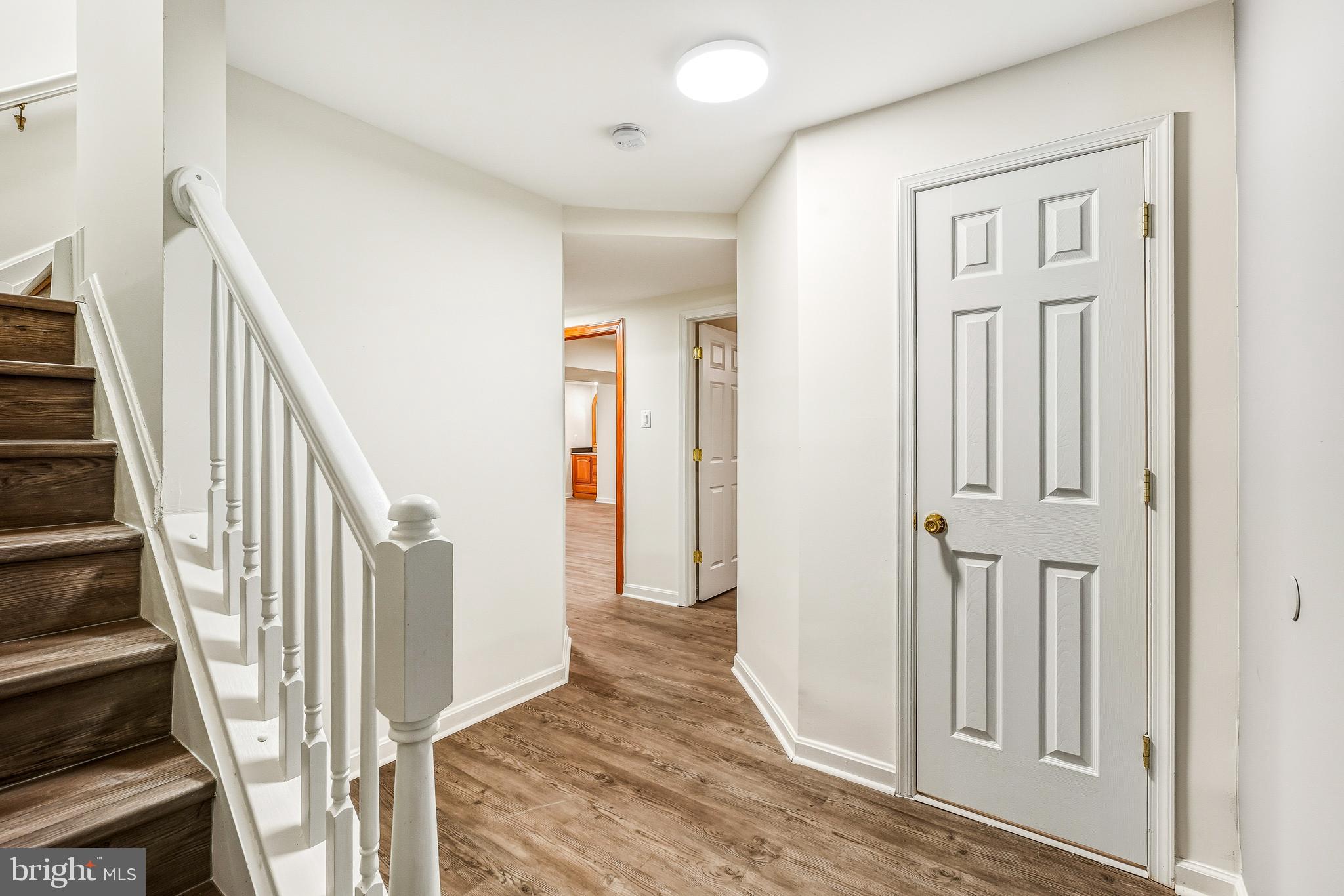 315 Argosy Drive Gaithersburg, MD 20878 - Photo 34 of 48 a view of a hallway with wooden floor and entryway