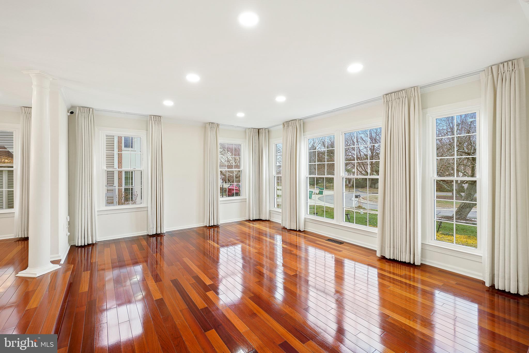 315 Argosy Drive Gaithersburg, MD 20878 - Photo 8 of 48 a view of an empty room with wooden floor and a window