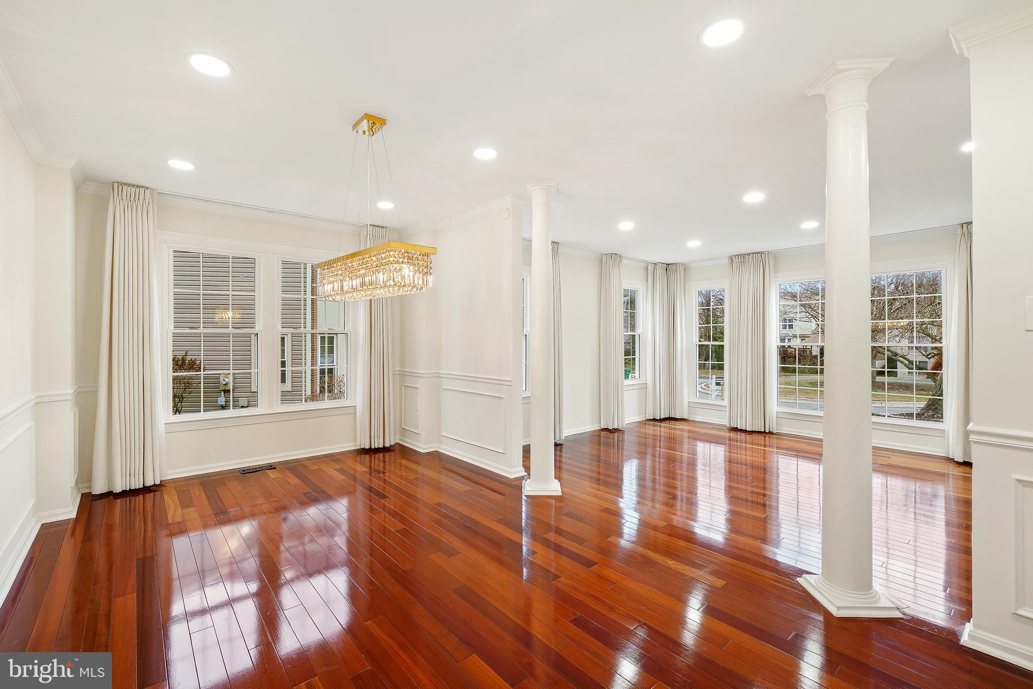 315 Argosy Drive Gaithersburg, MD 20878 - Photo 10 of 48 a view of an empty room with wooden floor and a window