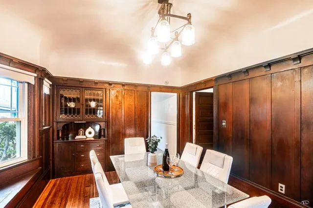 a view of a patio with a table and chairs