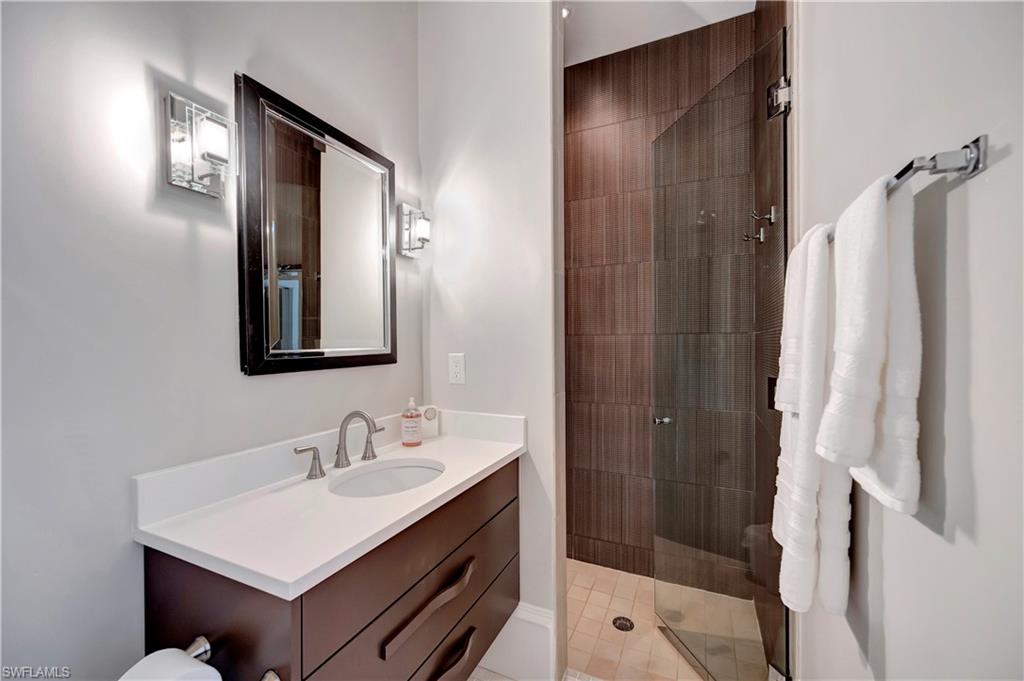 1375 Gordon Drive Naples, FL 34102 - Photo 17 of 37 Primary Bath