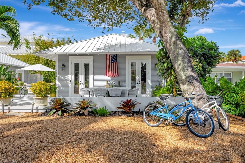 1375 Gordon Drive Naples, FL 34102 - Photo 33 of 37 Al Fresco Dining Patio