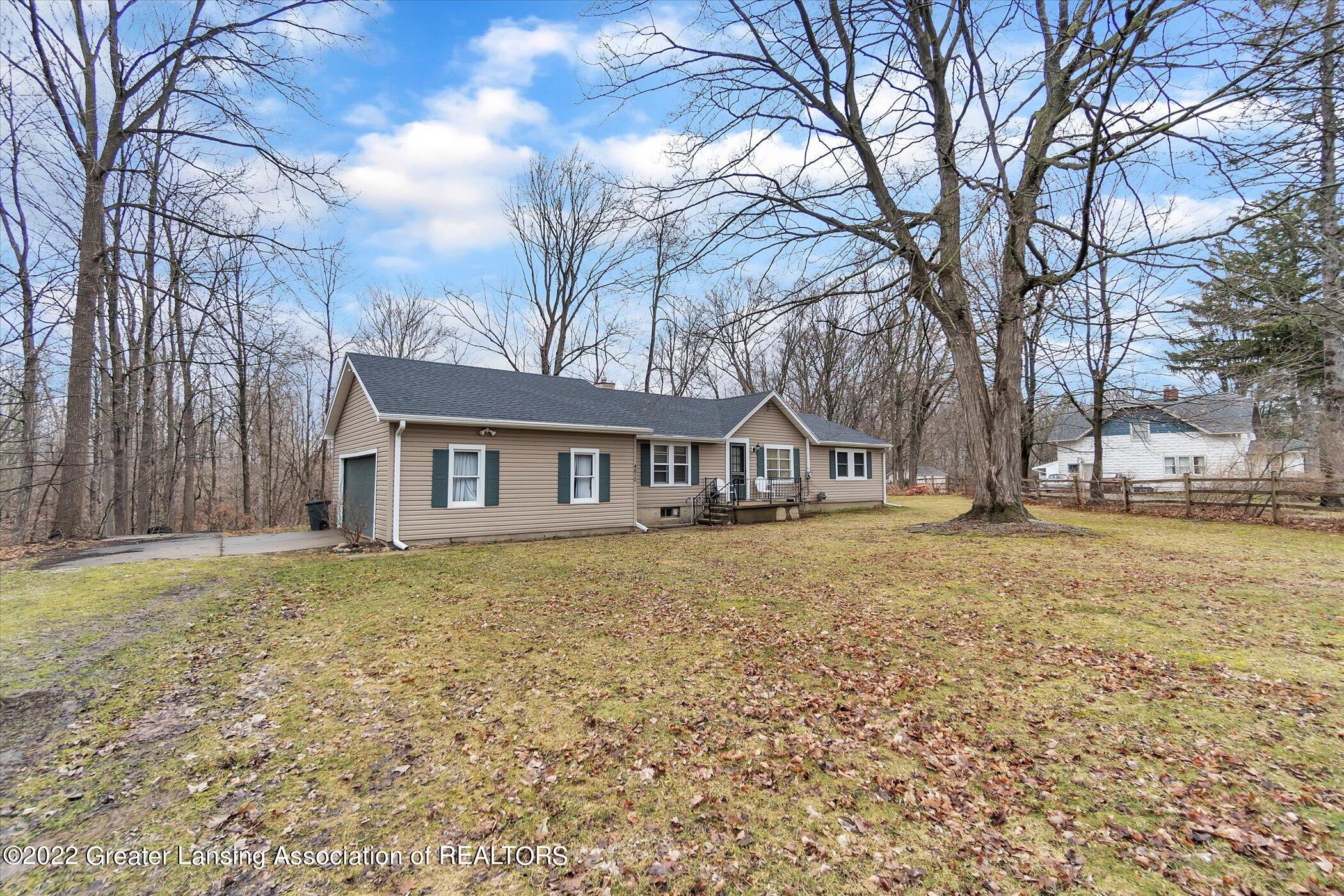 4610 Old Lansing Road Lansing, MI 48917 - Photo 3 of 43 03-4610-Old-Lansing-Rd-WindowStill-Real-