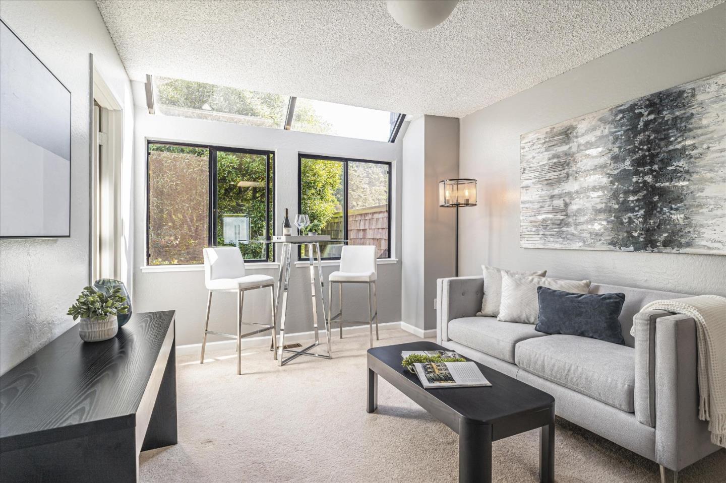 290 Beachview Avenue, Unit 39 Pacifica, CA 94044 - Photo 25 of 63 a living room with furniture and a large window