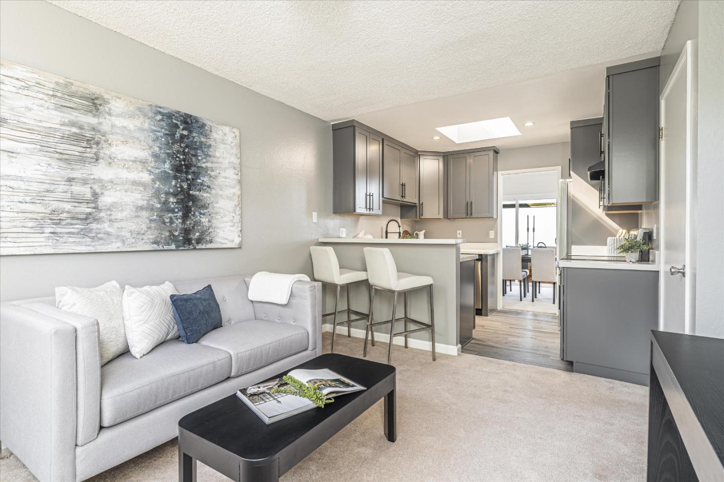 290 Beachview Avenue, Unit 39 Pacifica, CA 94044 - Photo 26 of 63 a living room with furniture and a large window