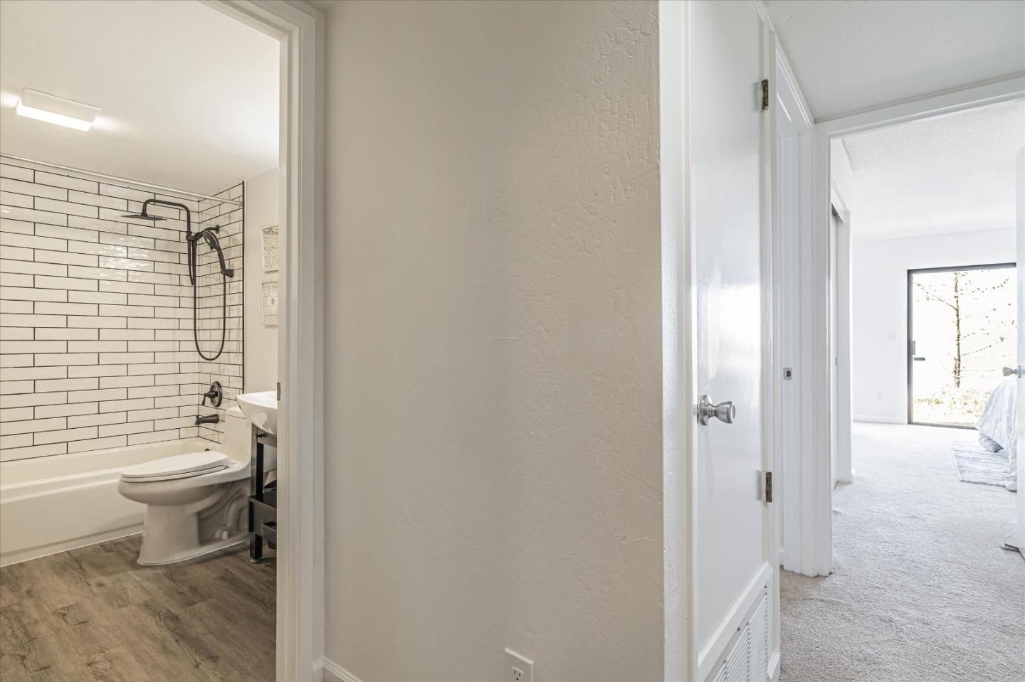 290 Beachview Avenue, Unit 39 Pacifica, CA 94044 - Photo 27 of 63 a bathroom with a toilet a sink and shower