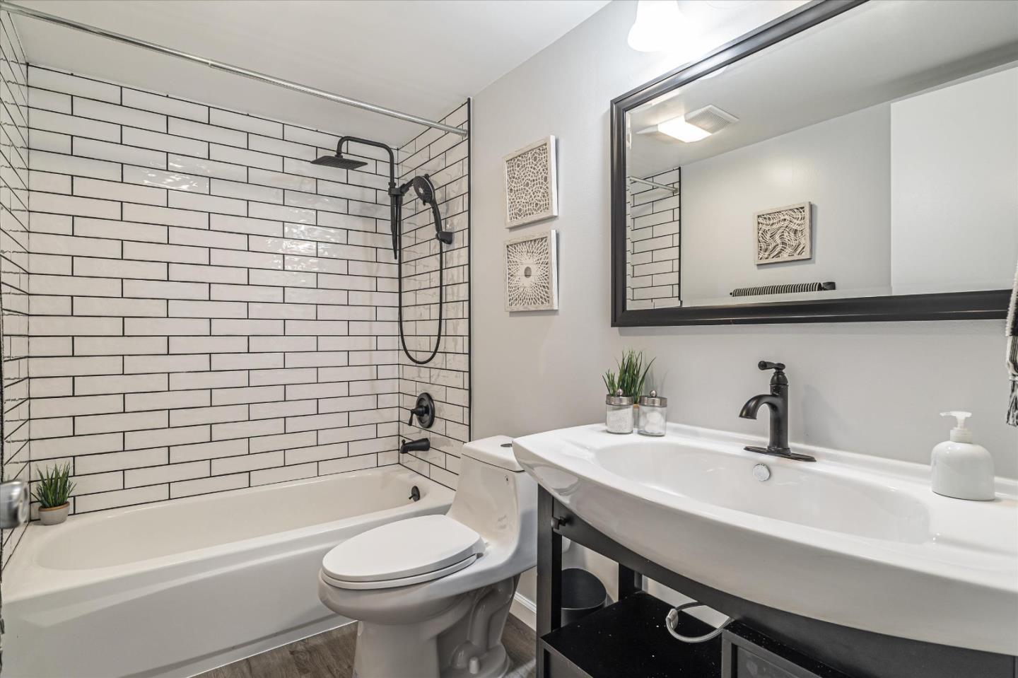 290 Beachview Avenue, Unit 39 Pacifica, CA 94044 - Photo 28 of 63 a bathroom with a sink a toilet and shower