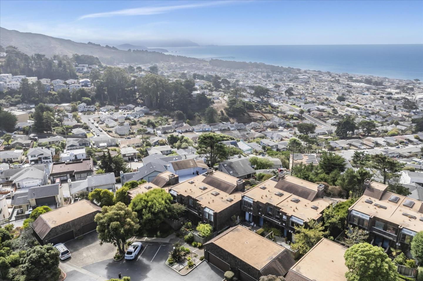 290 Beachview Avenue, Unit 39 Pacifica, CA 94044 - Photo 3 of 63 an aerial view of a city with lots of residential buildings