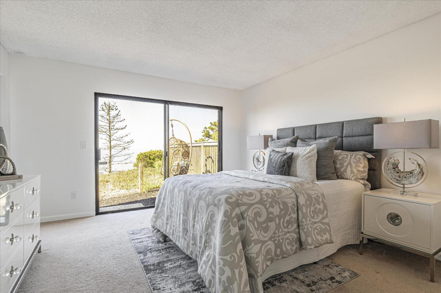 290 Beachview Avenue, Unit 39 Pacifica, CA 94044 - Photo 33 of 63 a bedroom with a bed and a large window