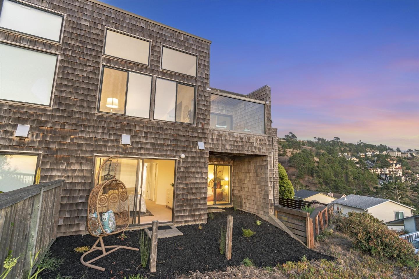 290 Beachview Avenue, Unit 39 Pacifica, CA 94044 - Photo 48 of 63 a front view of a house with outdoor seating