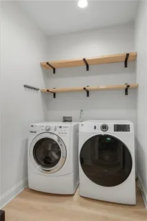 a utility room with dryer and washer