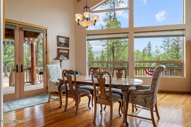 a front view of a house with a garden and patio