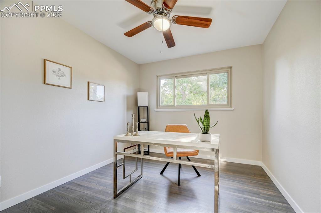 2326 Condor Street Colorado Springs, CO 80909 - Photo 23 of 47 a workspace with furniture and a window