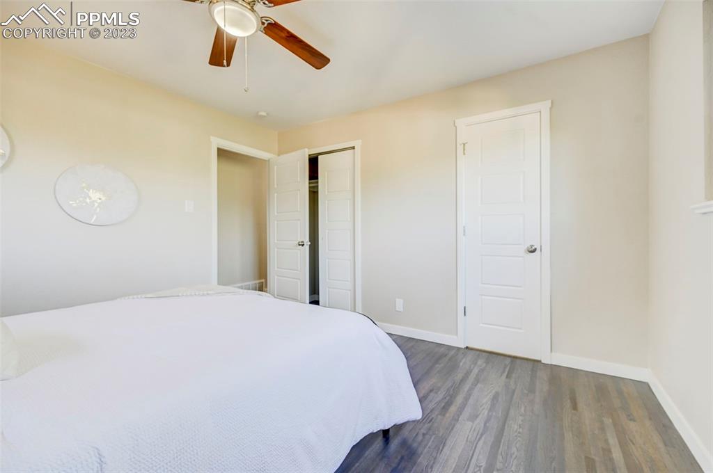 2326 Condor Street Colorado Springs, CO 80909 - Photo 30 of 47 a large white bed in a white room