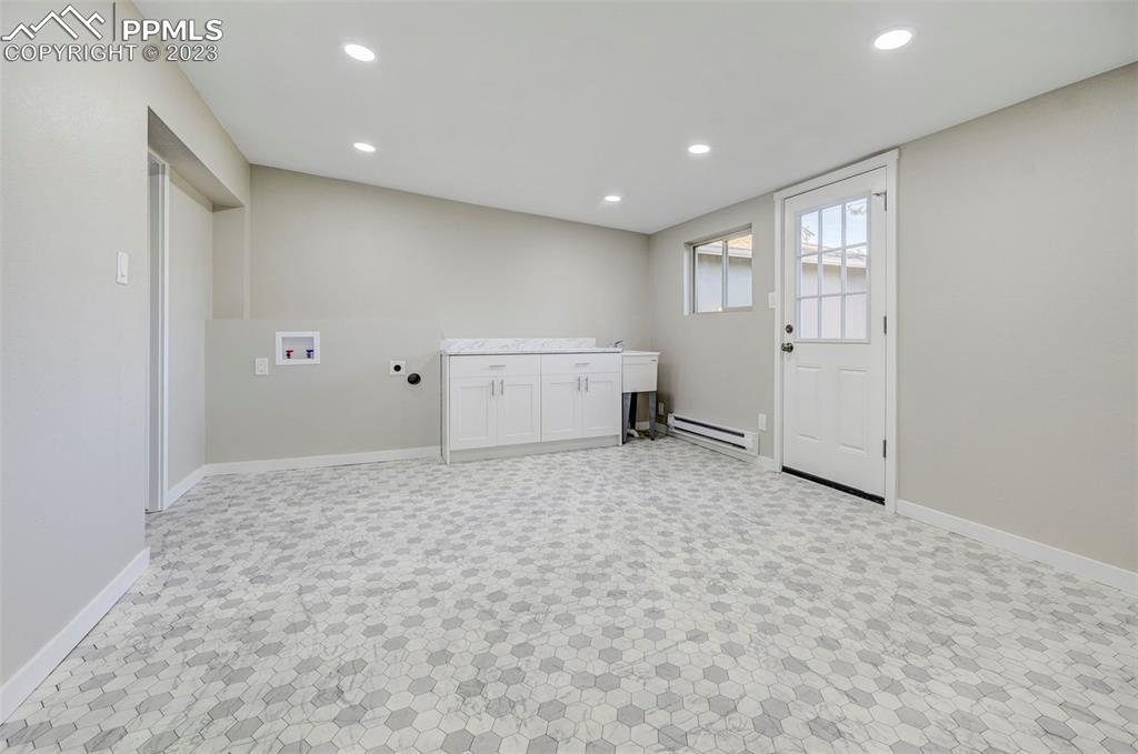 2326 Condor Street Colorado Springs, CO 80909 - Photo 39 of 47 a view of a livingroom with natural light