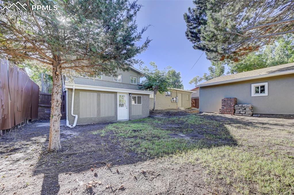 2326 Condor Street Colorado Springs, CO 80909 - Photo 46 of 47 a house view with a backyard space