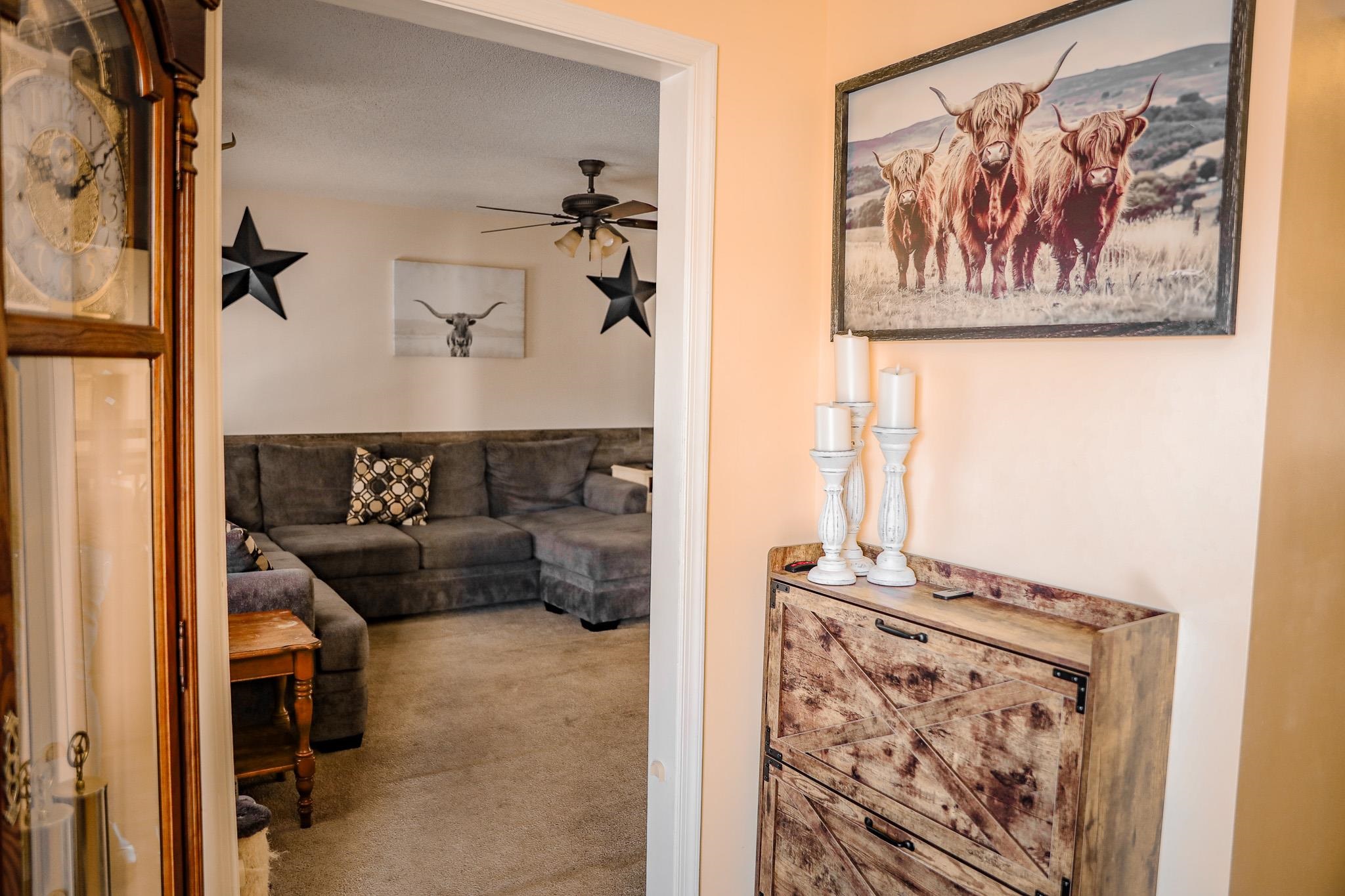 126 Pheasant Run Waynesboro, VA 22980 - Photo 17 of 45 a view of a hallway with paintings on the wall
