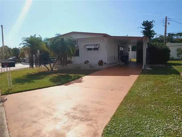 a view of a back yard of the house