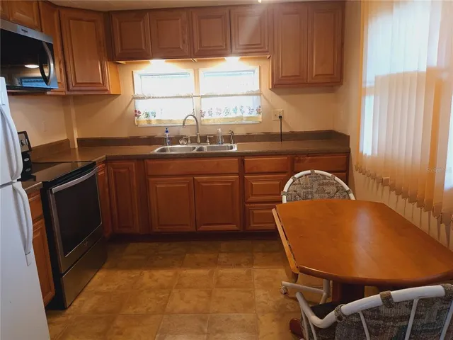 a bathroom with a shower and a toilet