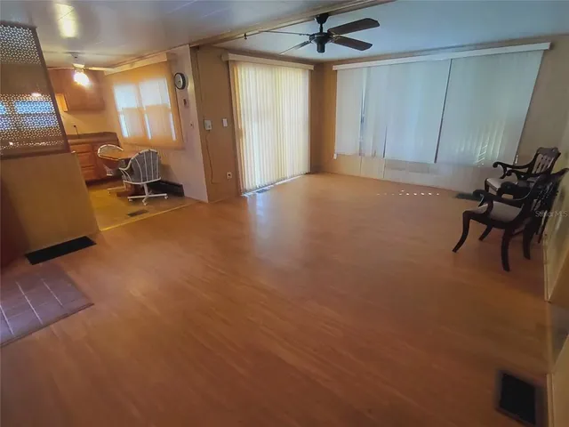 a kitchen with a sink cabinets and window