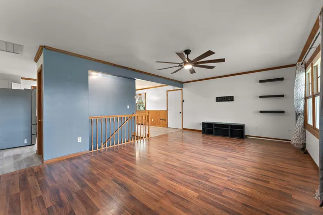 a bathroom with a double vanity sink mirror and bathtub