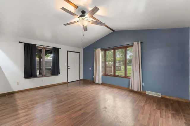 a view of a house with a back yard