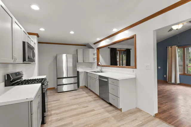 a dining room with furniture and window