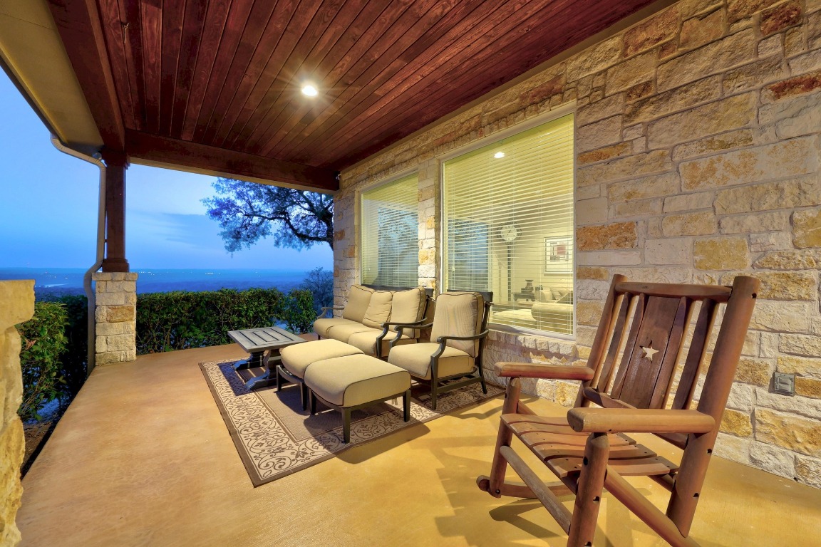 28701 Valley Road Marble Falls, TX 78654 - Photo 21 of 36 a building outdoor space with patio furniture and potted plants