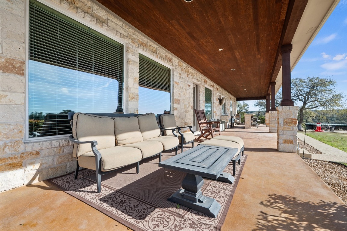 28701 Valley Road Marble Falls, TX 78654 - Photo 22 of 36 a patio outdoor space with patio furniture and a potted plant
