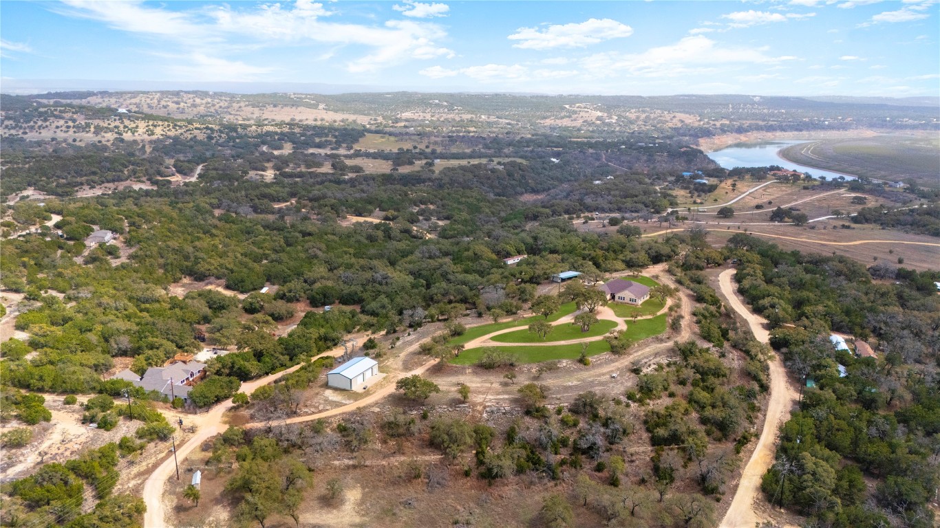 28701 Valley Road Marble Falls, TX 78654 - Photo 32 of 36 an aerial view of residential houses with outdoor space