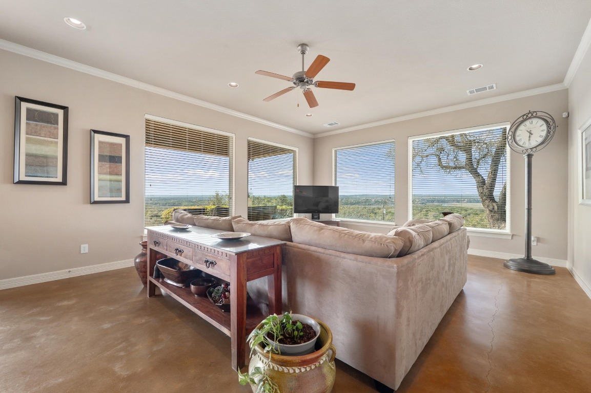 28701 Valley Road Marble Falls, TX 78654 - Photo 10 of 36 a living room with furniture and a large window