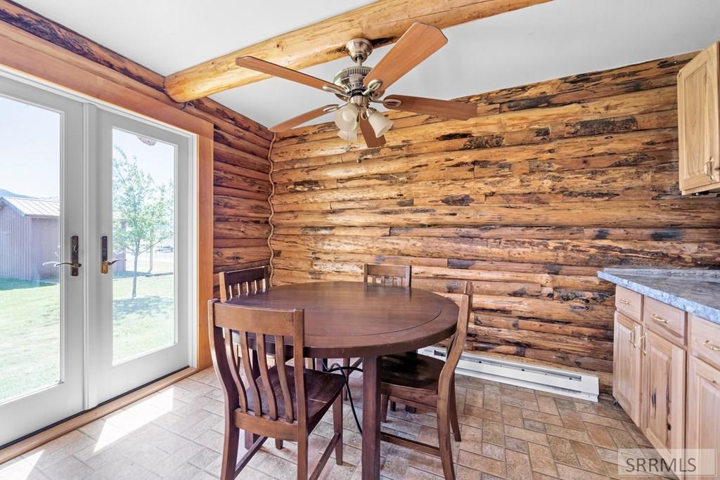 102 Valley Drive Irwin, ID 83428 - Photo 11 of 34 Dining area with double doors to the backyard