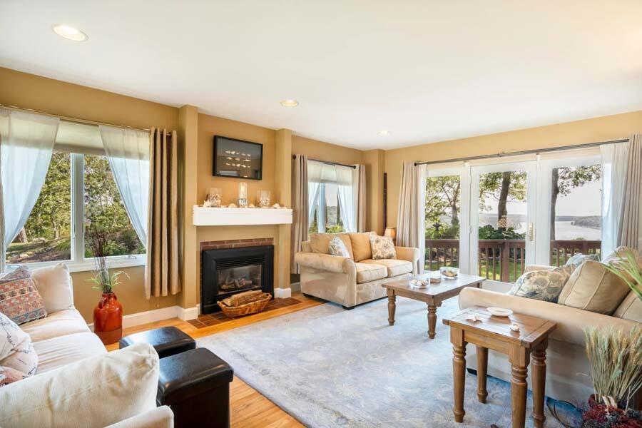 8 Dogwood Road Buzzards Bay, MA 02532 - Photo 4 of 16 a living room with furniture and a fireplace
