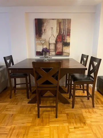 a view of a dining room with furniture