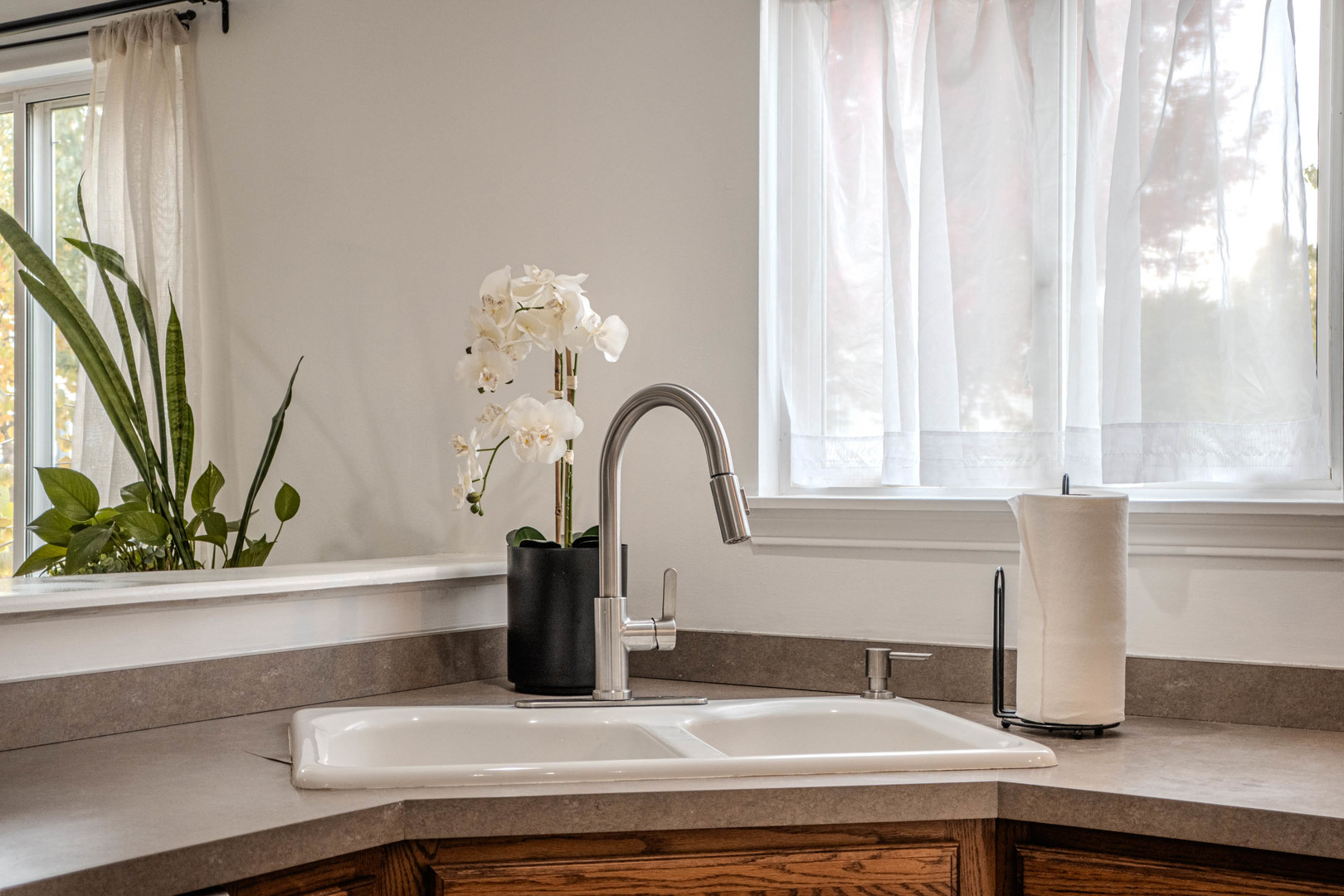 215 Alexis Street Plano, IL 60545 - Photo 15 of 42 a kitchen with a sink and a window