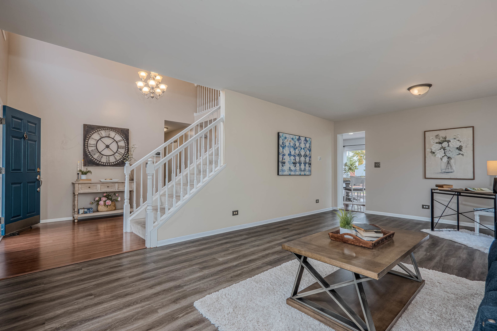 215 Alexis Street Plano, IL 60545 - Photo 6 of 42 a workspace with furniture window and wooden floor