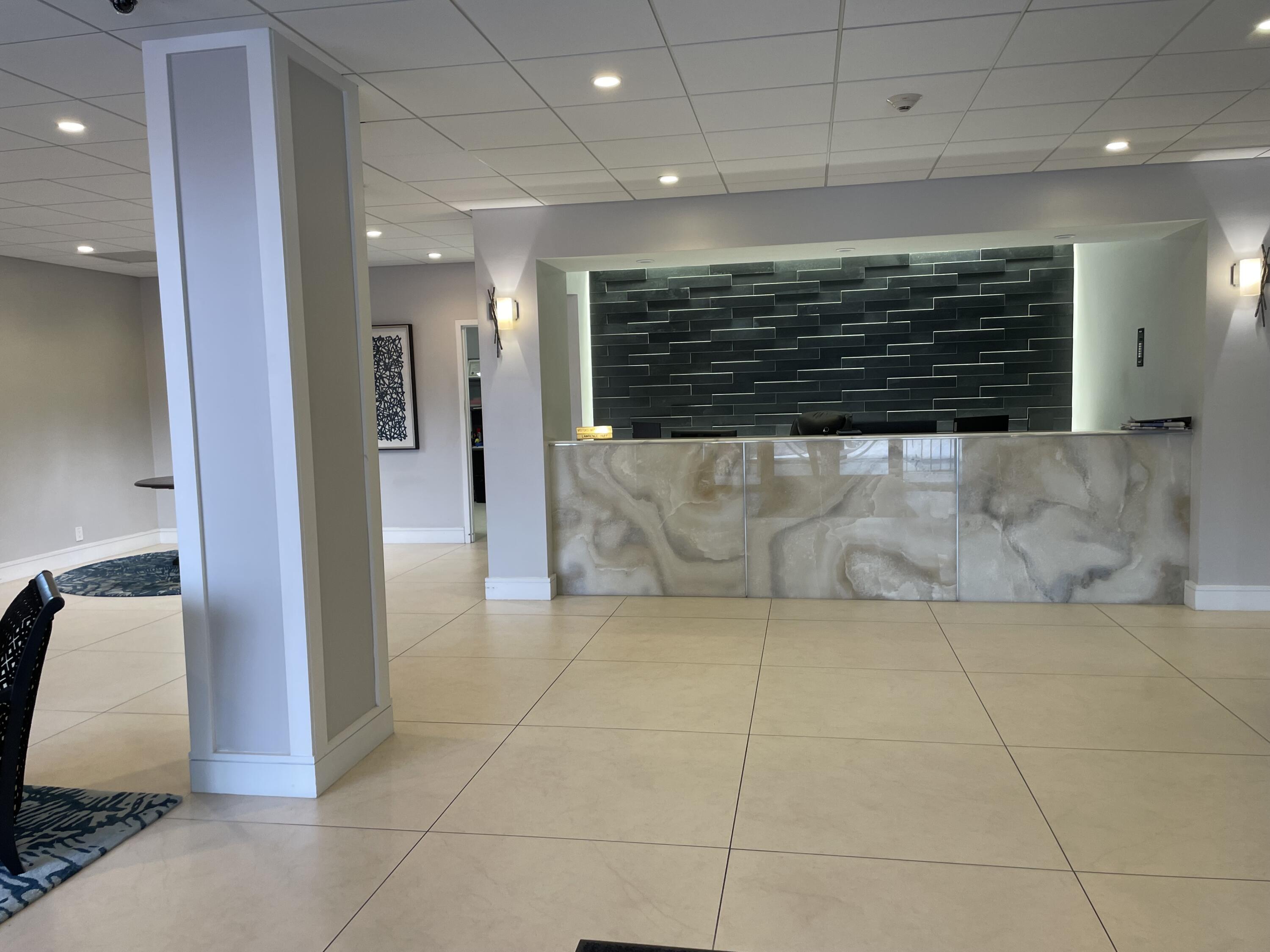 1180 South Ocean Boulevard, Unit 17D Boca Raton, FL 33432 - Photo 30 of 37 lobby desk
