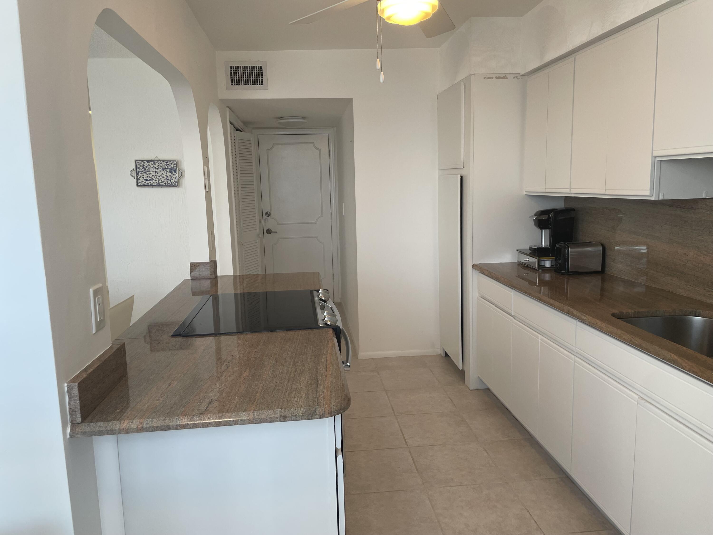 1180 South Ocean Boulevard, Unit 17D Boca Raton, FL 33432 - Photo 8 of 37 kitchen 2