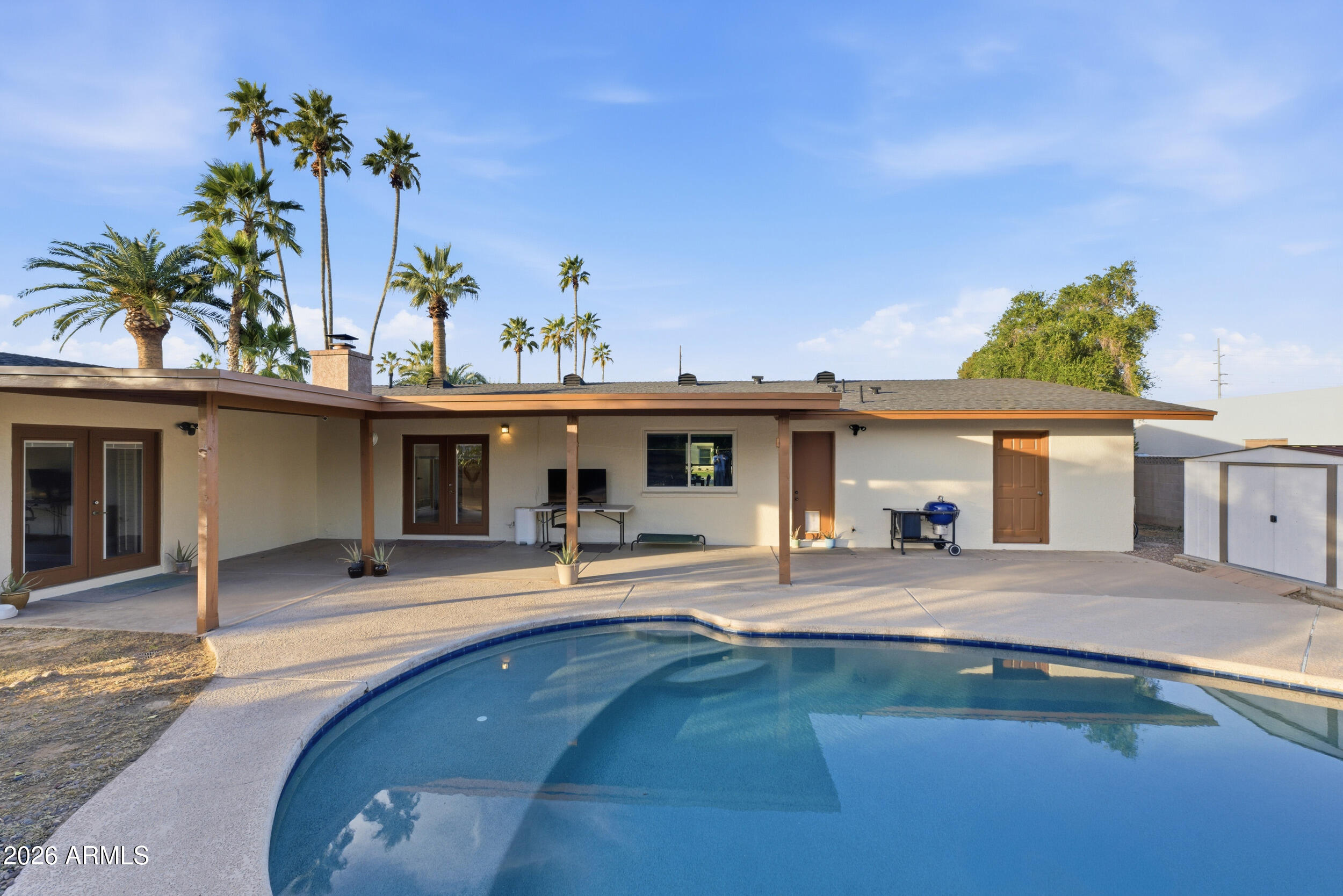 3541 East Cannon Drive Phoenix, AZ 85028 - Photo 13 of 42 a view of a house with a patio