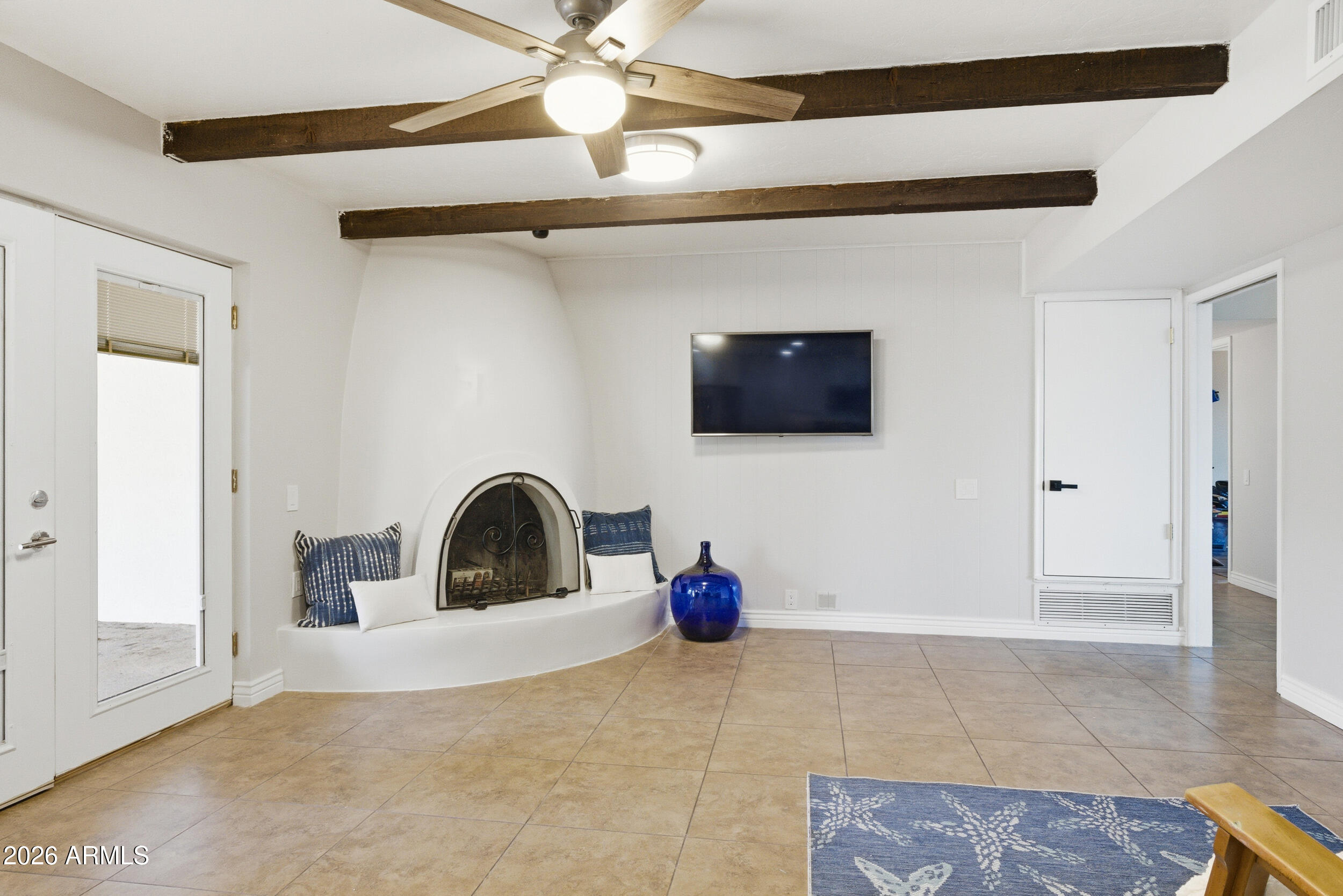 3541 East Cannon Drive Phoenix, AZ 85028 - Photo 20 of 42 a bedroom with a bed and a flat screen tv
