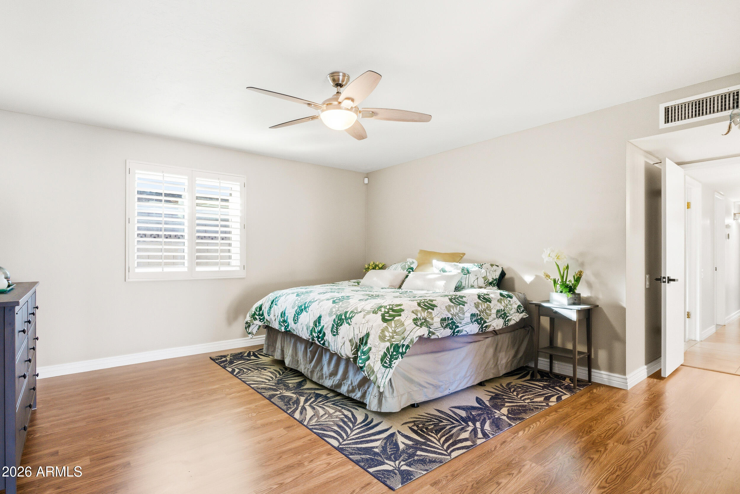 3541 East Cannon Drive Phoenix, AZ 85028 - Photo 21 of 42 a bedroom with a bed and a window