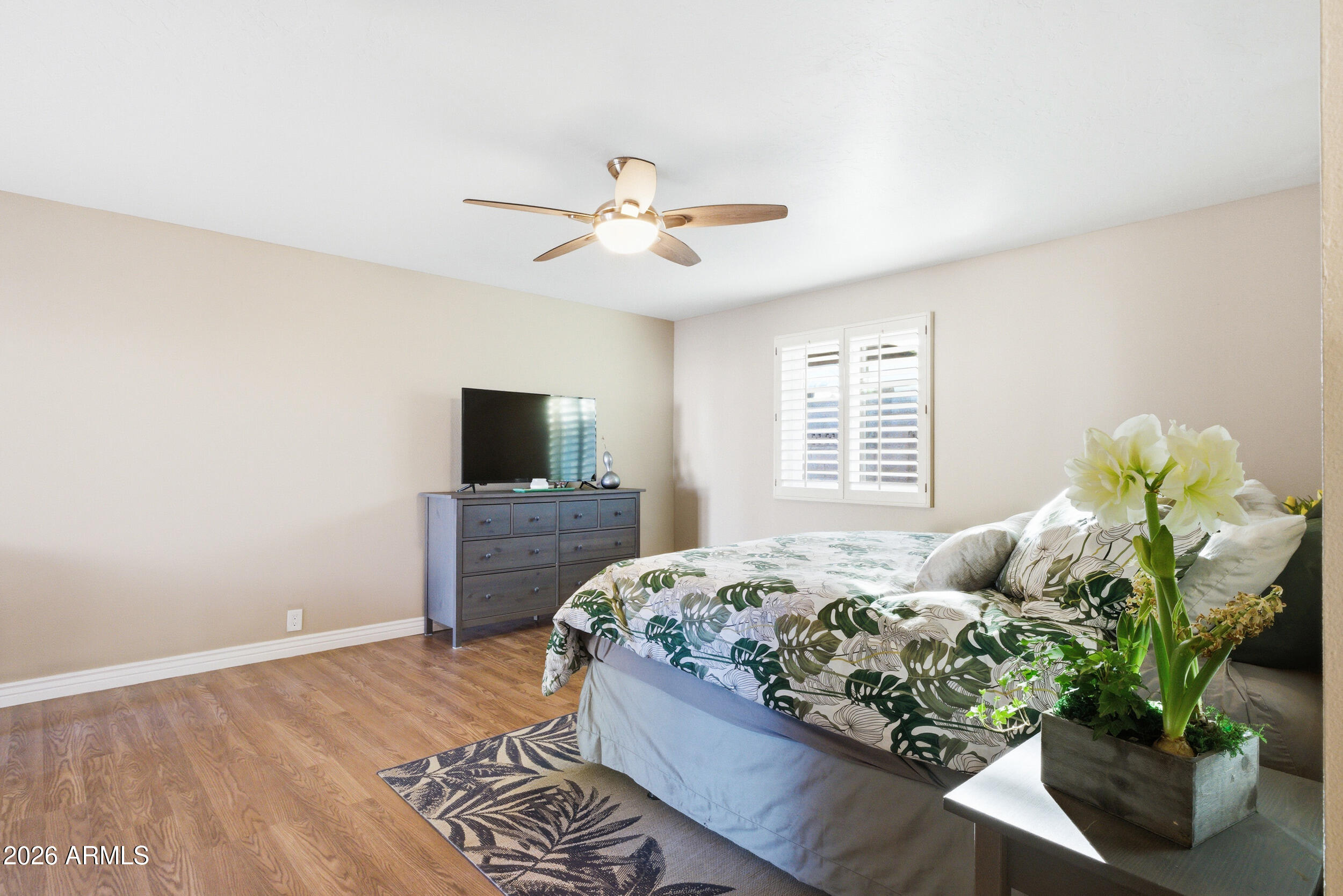 3541 East Cannon Drive Phoenix, AZ 85028 - Photo 23 of 42 a living room with furniture and a flat screen tv