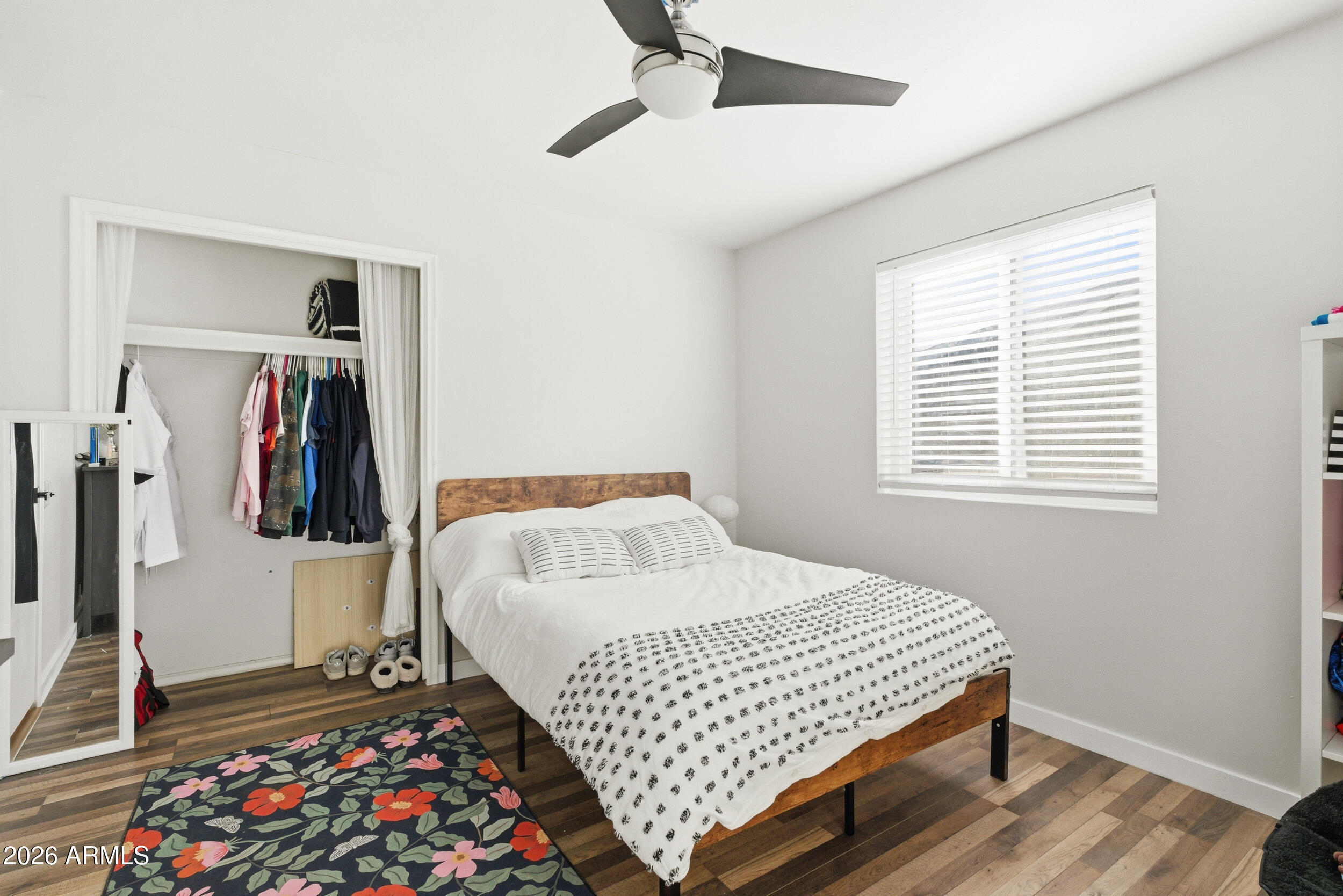 3541 East Cannon Drive Phoenix, AZ 85028 - Photo 32 of 42 a bedroom with a bed and a window