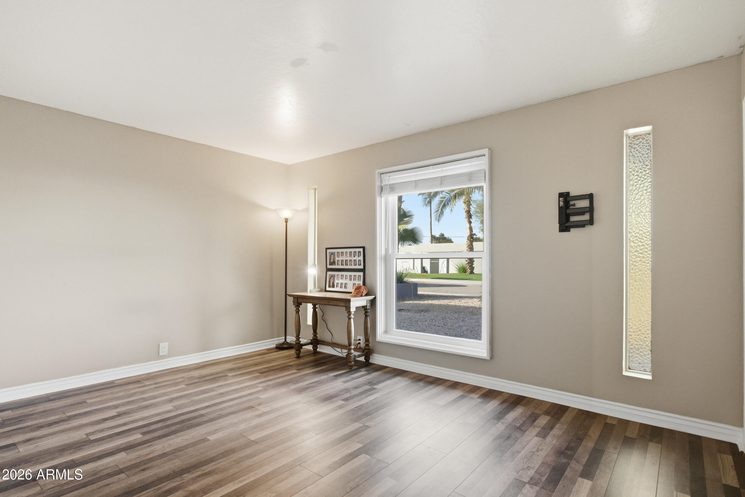 3541 East Cannon Drive Phoenix, AZ 85028 - Photo 34 of 42 a view of a room with wooden floor closet and windows