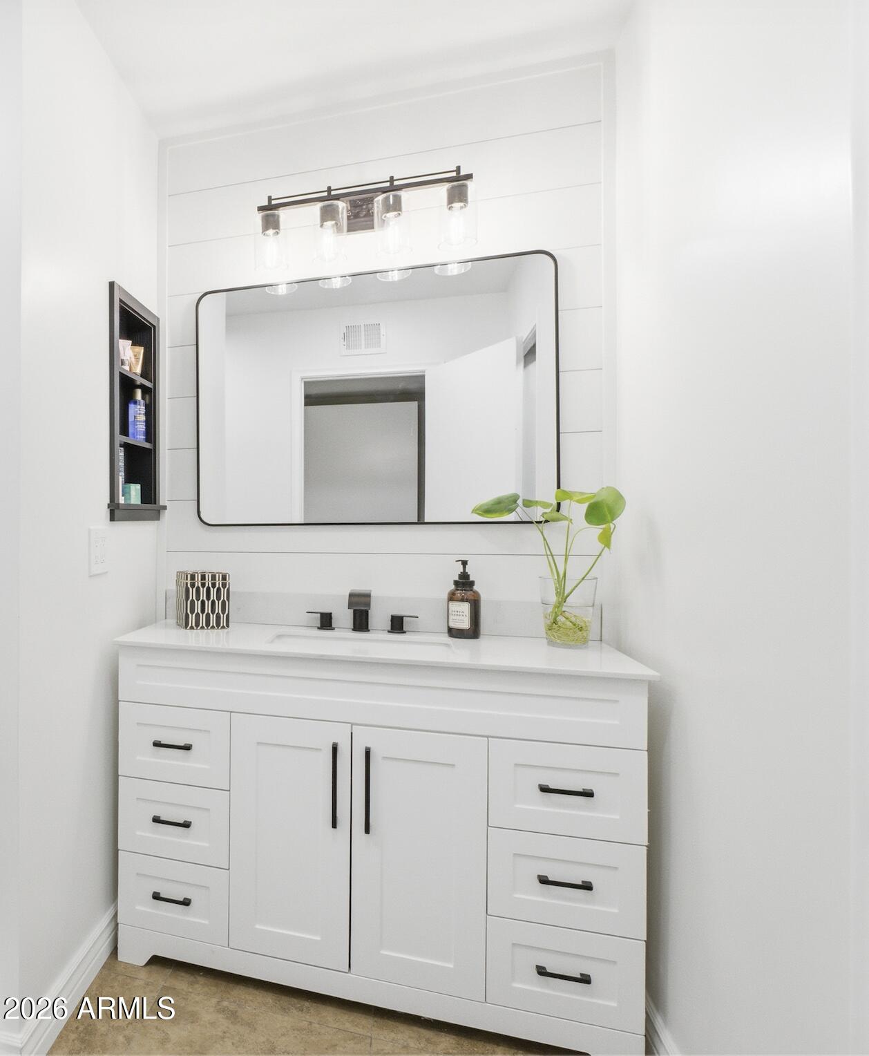 3541 East Cannon Drive Phoenix, AZ 85028 - Photo 8 of 42 a bathroom with a sink vanity and mirror