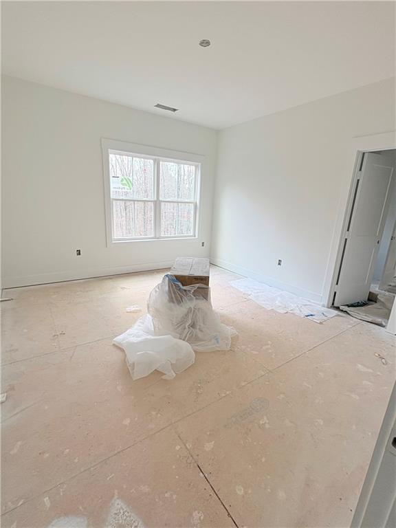 4013 Jersey Covington Road Covington, GA 30014 - Photo 19 of 29 a large bed sitting in a room next to a window