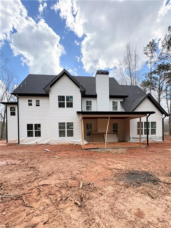 4013 Jersey Covington Road Covington, GA 30014 - Photo 26 of 29 a front view of a house with a yard